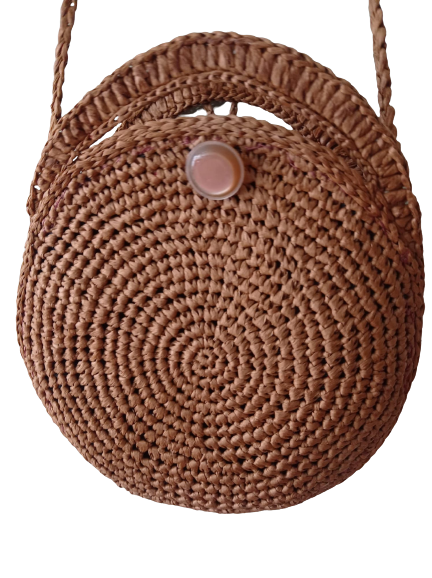 A brown Raffia Bag