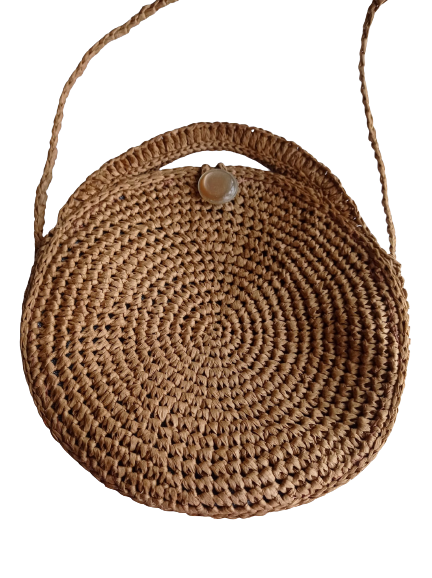 A brown Raffia Bag